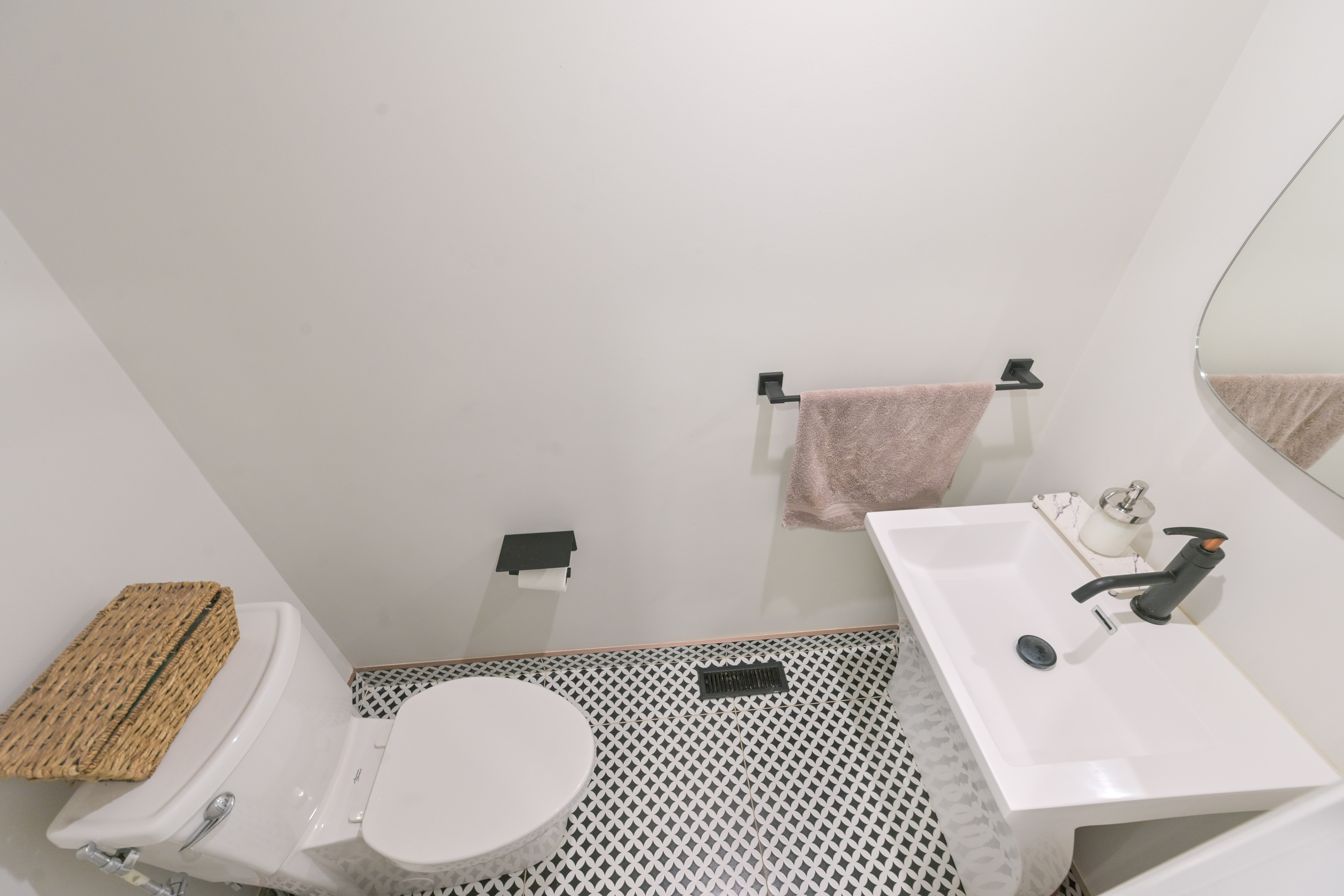 Powder room with patterned floor
